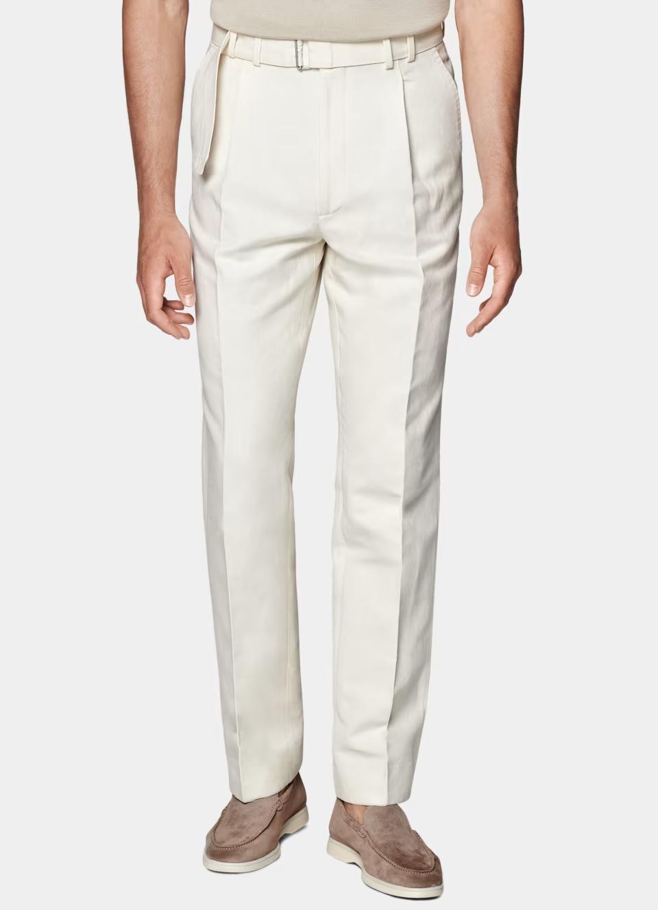 <p><a href="https://go.redirectingat.com?id=74968X1596630&url=https%3A%2F%2Fsuitsupply.com%2Fen-us%2Fmen%2Ftrousers%2Foff-white-belted-sortino-pants%2FB2900.html%3Fgad_source%3D1%26gclid%3DCj0KCQjwztOwBhD7ARIsAPDKnkBkb0buSnbcT69NydGsymhwCnyfXmXFzvBXQqsT-RvV5GQxXe1dBnQaAr1_EALw_wcB&sref=https%3A%2F%2Fwww.esquire.com%2Fstyle%2Fmens-fashion%2Fg60443576%2Fbest-high-waisted-pants%2F" rel="nofollow noopener" target="_blank" data-ylk="slk:Shop Now;elm:context_link;itc:0;sec:content-canvas" class="link ">Shop Now</a></p><p>Belted Sortino Pants</p><p>suitsupply.com</p><p>$199.00</p>