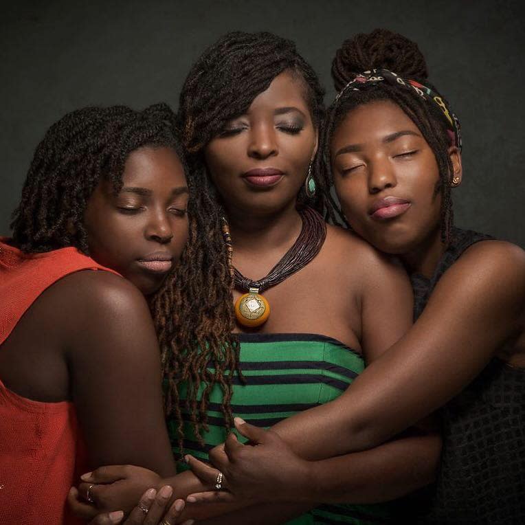 The author, center, and her daughters. (Photo: Erskine Isaac)