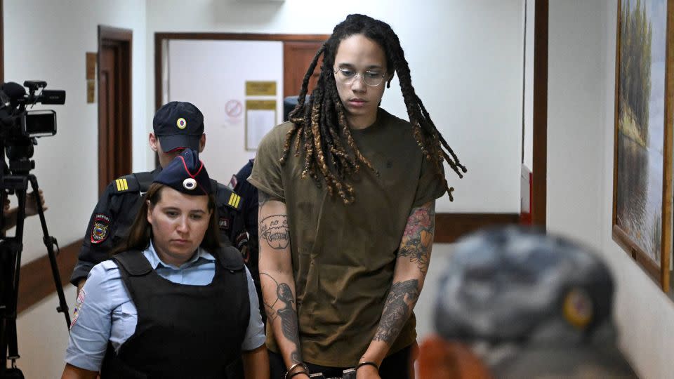 Griner is escorted to a court hearing in Khimki outside Moscow in August 2022. - Natalia Kolesnikova/Reuters