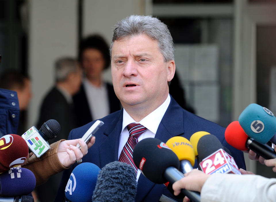 Gjorge Ivanov, the current Macedonian President and a candidate of the ruling conservative VMRO-DPMNE party, speaks to the media after casting his ballot for the presidential elections in Skopje, Macedonia, on Sunday, April 13, 2014. Macedonia votes on the fifth presidential elections since the country's independence. (AP Photo/Boris Grdanoski)