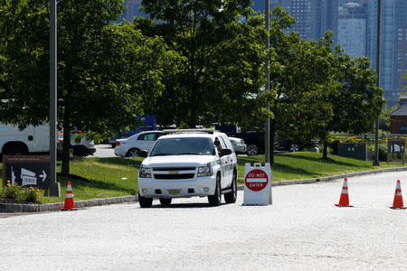 A New Jersey State Park Police car blocks the entrance to Liberty State Park during a partial state government shutdown in Jersey City, New Jersey U.S., July 3, 2017. REUTERS/Brendan McDermid