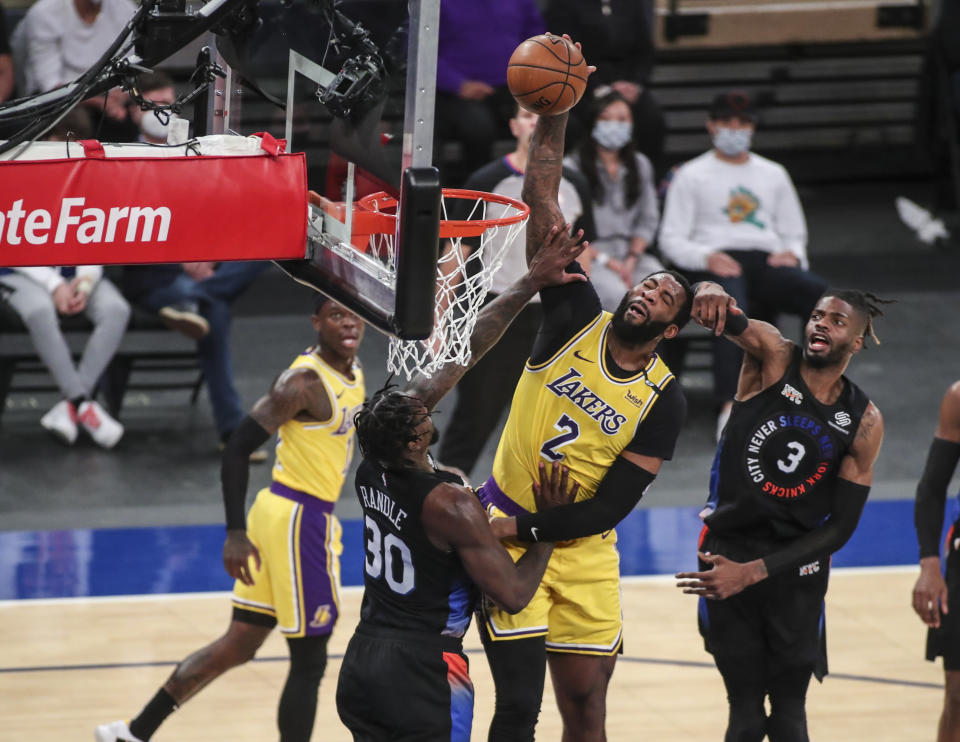 Los Angeles Lakers center Andre Drummond (2) dunks against the New York Knicks in the second quarter of an NBA basketball game at Madison Square Garden in New York, Monday, April 12, 2021. (Wendell Cruz/Pool Photo via AP)