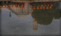 Soldiers are reflected in water from a fountain during rehearsals for the upcoming Republic Day parade in New Delhi, India, Thursday, Jan. 21, 2021. Republic Day marks the anniversary of the adoption of the country's constitution on Jan. 26, 1950. Thousands congregate on Rajpath, a ceremonial boulevard in New Delhi, to watch a flamboyant display of the country’s military power and cultural diversity. (AP Photo/Manish Swarup)