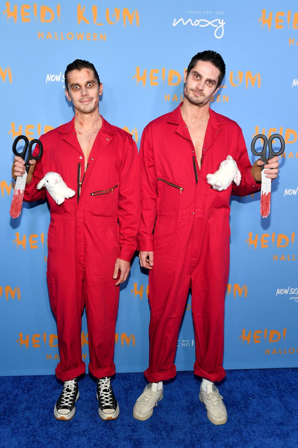 Antoni Porowski and Kevin Harrington dressed as characters for horror film "Us" for Heidi Klum's annual Halloween party