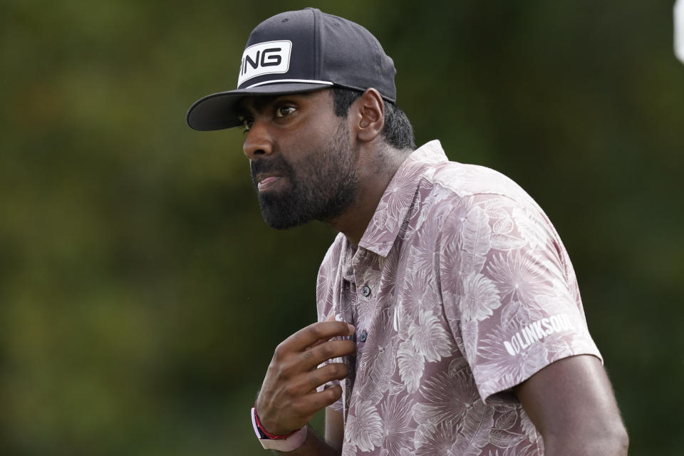 Sahith Theegala looks at his lay following his drive from the third tee during the final round of the Sanderson Farms Championship golf tournament in Jackson, Miss., Sunday, Oct. 3, 2021. (AP Photo/Rogelio V. Solis)