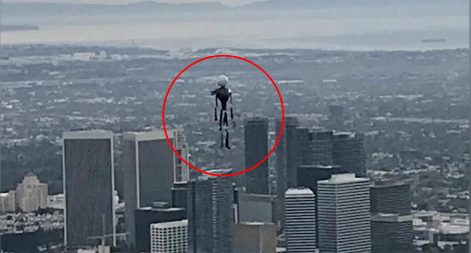 A flying object which looks like a mannequin flying across LA.