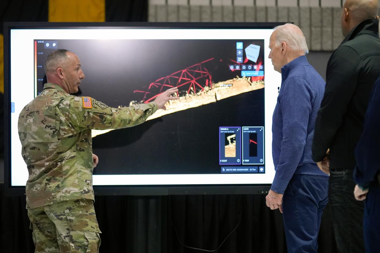 President Joe Biden participates in an operational briefing on the response and recovery efforts of the collapsed Francis Scott Key Bridge, Friday, April 5, 2024 in Dundalk, Md., as Maryland Gov. Wes Moore, right, looks on. (AP)