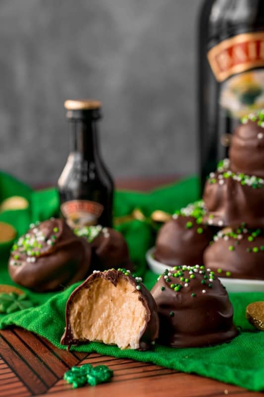 <p>Sugar and Soul</p><p>No Bake Bailey’s Cheesecake Balls have a creamy 4-ingredient Irish cream cheesecake filling that’s then dipped in smooth melted chocolate! </p><p><strong>Get the recipe: </strong><a href="https://www.sugarandsoul.co/baileys-cheesecake-balls/" rel="nofollow noopener" target="_blank" data-ylk="slk:No-Bake Bailey’s Cheesecake Balls;elm:context_link;itc:0;sec:content-canvas" class="link rapid-noclick-resp"><strong>No-Bake Bailey’s Cheesecake Balls</strong></a></p>