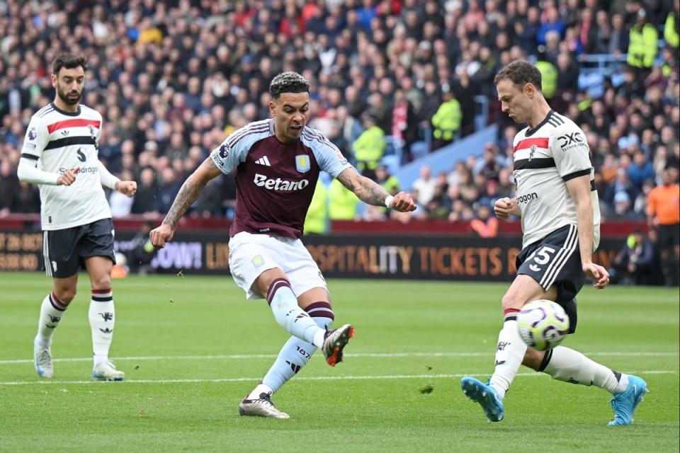 Morgan Rogers sees his shot blocked by Jonny Evans (Getty)