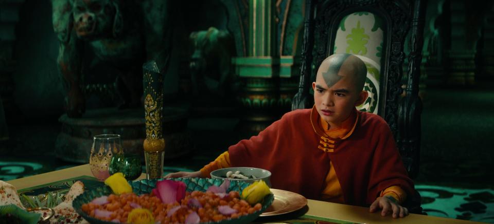 Gordon Cormier eats a Pakistani-inspired feast in "Avatar: The Last Airbender"<span class="copyright">Courtesy of Netflix</span>