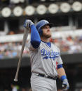 Los Angeles Dodgers' Max Muncy (13) strikes out with runners on base against the San Francisco Giants during the fifth inning of a baseball game in San Francisco, Saturday, Sept. 29, 2018. (AP Photo/Jim Gensheimer)