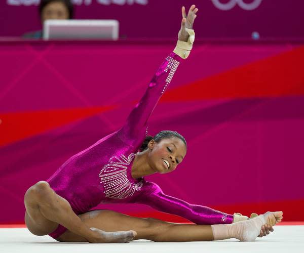 Gymnast leotards are, like the skating dresses at the Winter Games, one of our favourite parts of the Summer Olympics. They’re sparkly, they’re shiny, they’re… spandex! Love the statement necklace effect on US gymnast Gabrielle Douglas’ leotard. Her gold medal in the artistic gymnastics women's individual all-around competition will go well with that.  Gabrielle Douglas; Photo by Keystone Press