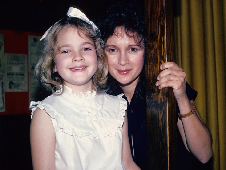 young Drew Barrymore with her mother, Jaid.
