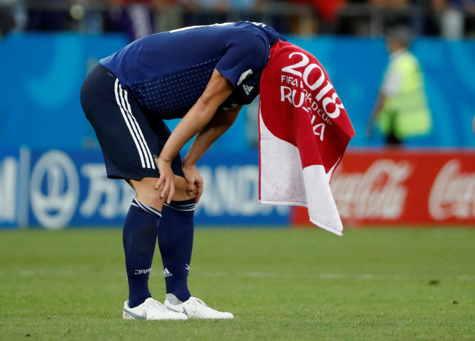 <p>Japan’s Gen Shoji looks dejected after the match REUTERS/Jorge Silva </p>