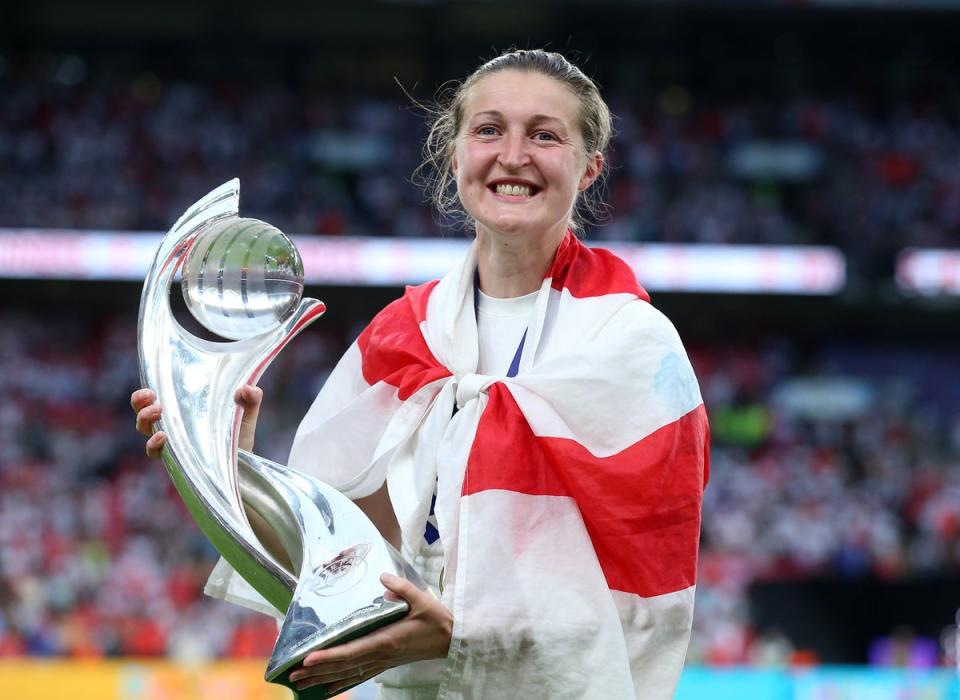 England’s Ellen White with the trophy (PA)