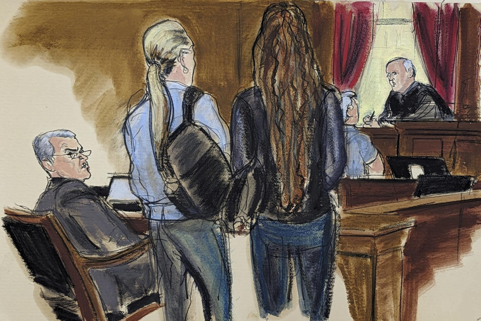 In this courtroom sketch, former Honduran President Juan Orlando Hernandez, seated left at the defense table, looks at prospective jurors who are waiting to speak with Judge P. Kevin Castel, right, during the jury selection process at the start of his trial, Tuesday, Feb. 20, 2024, in Manhattan federal court in New York. Nearly two years after his arrest and extradition to the U.S., Hernandez went on trial Tuesday on drug trafficking and weapons charges. (Elizabeth Williams via AP)