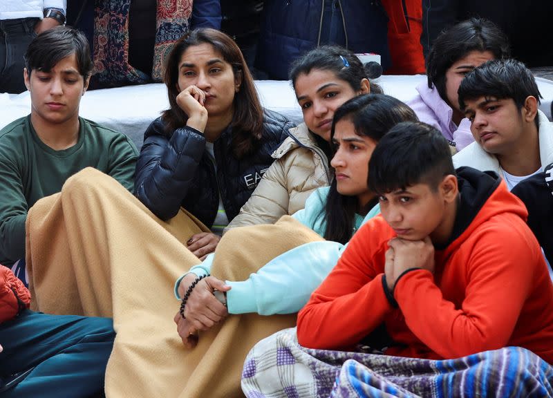 FILE PHOTO: Indian wrestlers take part in a protest demanding the disbandment of the WFI and the investigation of its head by the police, who they accuse of sexually harassing female players, at Jantar Mantar in New Delhi