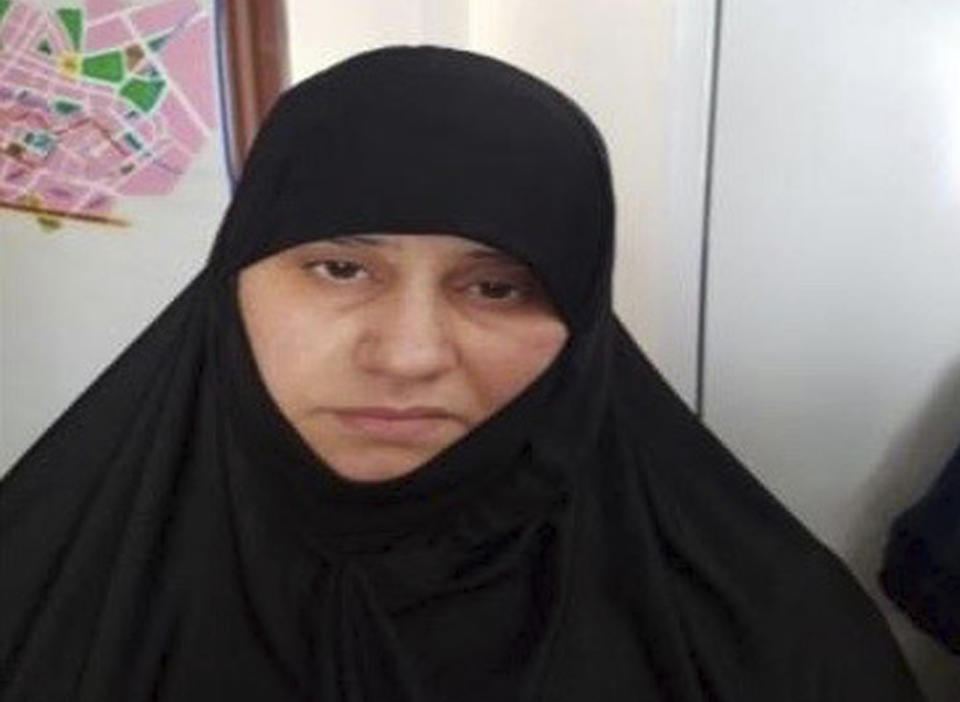 Undated handout photo made available by unnamed government sources showing a woman identified as Asma Fawzi Muhammad al-Qubaysi, a wife of the slain leader of the Islamic State group Abu Bakr al-Baghdadi. Turkey has captured a wife of the slain leader of the Islamic State group, Abu Bakr al-Baghdadi, Turkish President Recep Tayyip Erdogan said Wednesday Nov. 6, 2019. A senior Turkish official said the woman was among a group of 11 Islamic State suspects detained in a police operation in Turkey's Hatay province, near the border with Syria, on June 2, 2018.(Handout via AP)