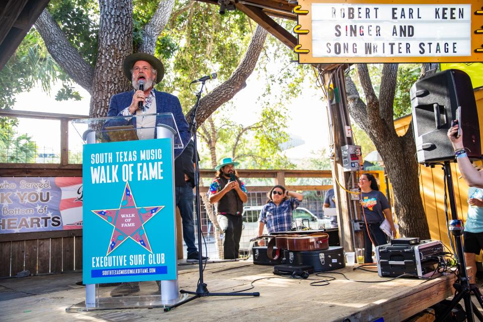 Robert Earl Keen gives remarks at the Executive Surf Club in Corpus Christi, Texas on Thursday, August 4, 2022. The downtown eatery renamed its stage to honor the Houston-born Americana music legend, and will add a star to its "Walk of Fame."