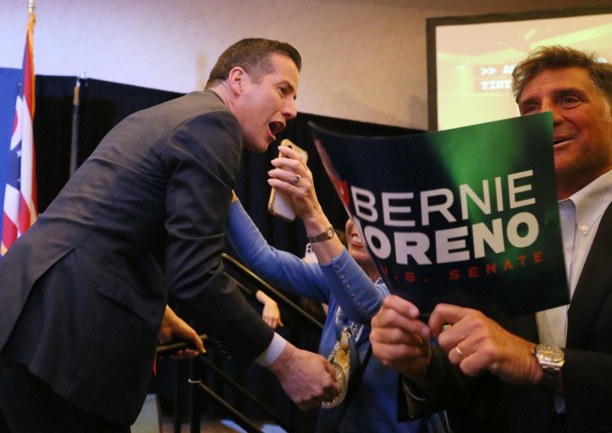 Bernie Moreno, GOP candidate for U.S. senator in Ohio, greets supporters at his watch party for the Republican Party primary at the DoubleTree hotel in Westlake.