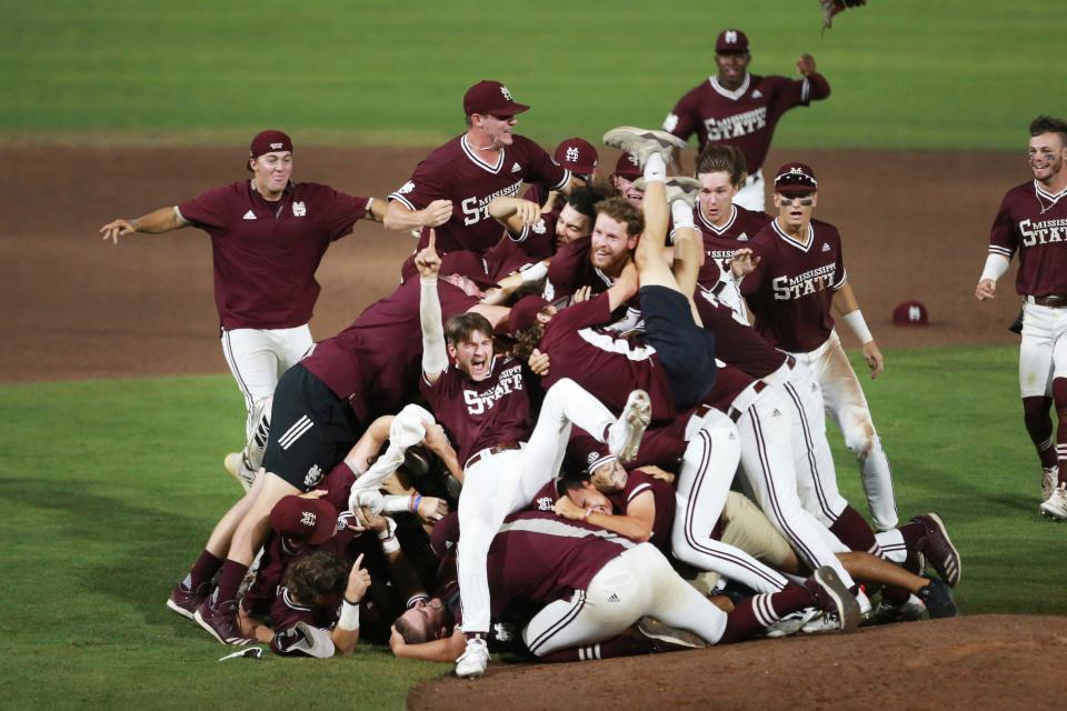 The Mississippi State Baseball team celebrates after defeating Notre Dame in an NCAA college baseball super regional game, Monday, June 14, 2021, in Starkville, Miss. (Adam Robison/The Northeast Mississippi Daily Journal via AP)