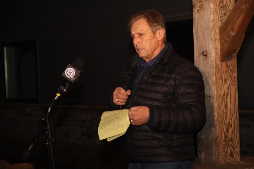 Gregg Hardy of Tipton, brother of Dee Warner, makes a statement about Warner's disappearance during a vigil for her Saturday at his farm.