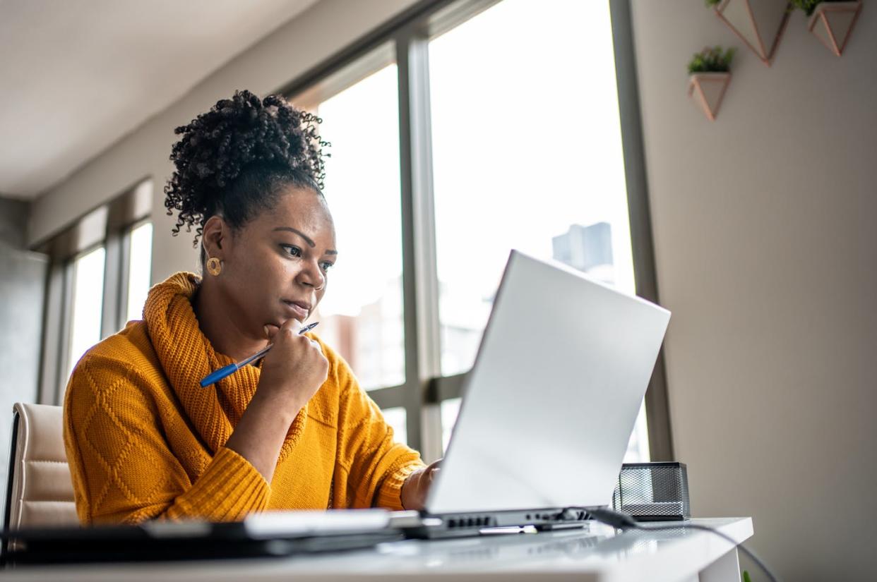 The payoff for microcredentials varies by profession. <a href="https://www.gettyimages.com/detail/photo/black-woman-working-from-home-office-royalty-free-image/1444291518?phrase=adult+laptop+at+home&adppopup=true" rel="nofollow noopener" target="_blank" data-ylk="slk:Drs Producoes via Getty Images;elm:context_link;itc:0;sec:content-canvas" class="link ">Drs Producoes via Getty Images</a>