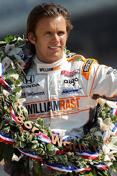 The two-time Indianapolis 500 winner died at the age of 33 after he was involved in a 15-car accident during a race in Las Vegas. His car collided with a fence post, which struck through the car and made contact with his helmet.