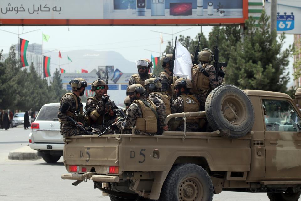 Taliban special force fighters arrive inside the Hamid Karzai International Airport after the U.S. military's withdrawal, in Kabul, Afghanistan, on Aug. 31, 2021. The Taliban were in full control of Kabul's international airport on Tuesday, after the last U.S. plane left its runway, marking the end of America's longest war.