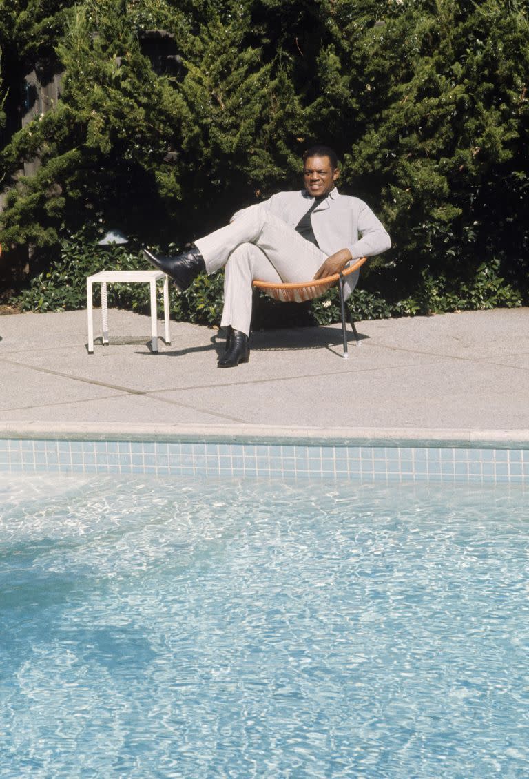 <p>San Francisco Giants outfielder Willie Mays relaxes by the pool at his home in 1960. </p>