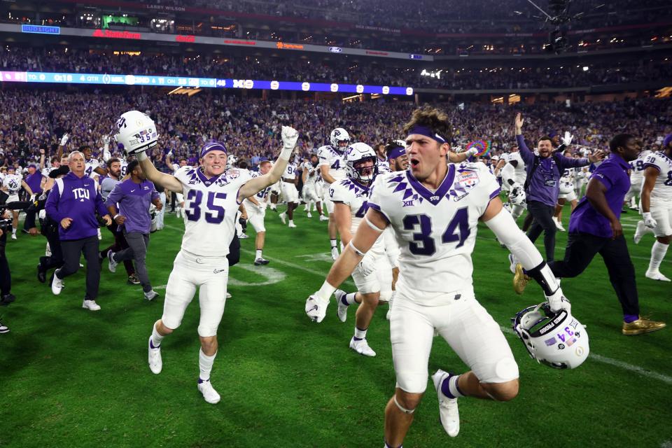 TCU wide receiver Colton Dobson (35) celebrates after the Horned Frogs defeated Michigan in the Fiesta Bowl at State Farm Stadium.