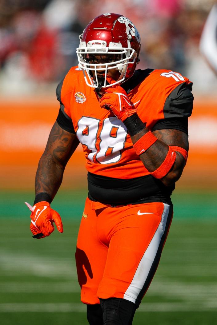 Feb 5, 2022; Mobile, AL, USA;  National Squad defensive lineman Perrion Winfrey of Oklahoma (98) reacts after a play in the first half against the American squad at Hancock Whitney Stadium.