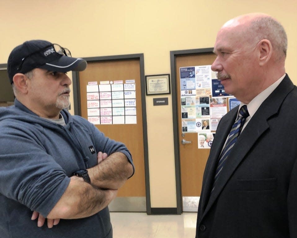 Berkley's new Town Administrator Mark Stankievicz, right, chats with Joe Freitas at a meet and greet prior to the Feb. 1 selectmen's meeting.