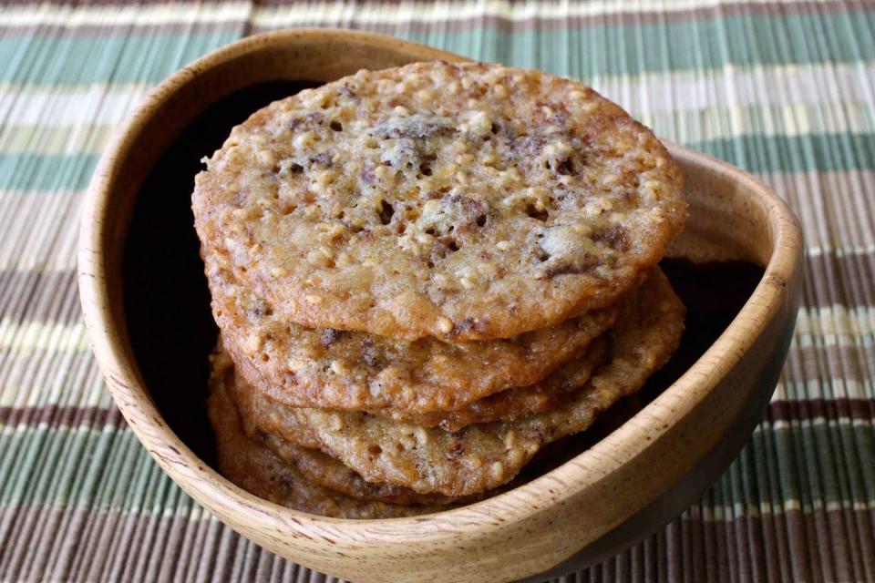 <p>These sesame seed—based cookies, called benne wafers, look a bit more like crackers than your typical dessert, but the Olde Colony Bakery in Charleston has kept the tradition alive for over 100 years. The toasted sesame lends a nutty flavor to the cookie, setting them apart from your typical holiday sweets. This chocolate and orange version will convert you.</p><p>Get the recipe from <a href="https://www.cookincanuck.com/chocolate-orange-benne-wafer-cookies/" rel="nofollow noopener" target="_blank" data-ylk="slk:Cookin' Canuck;elm:context_link;itc:0;sec:content-canvas" class="link ">Cookin' Canuck</a>.</p>