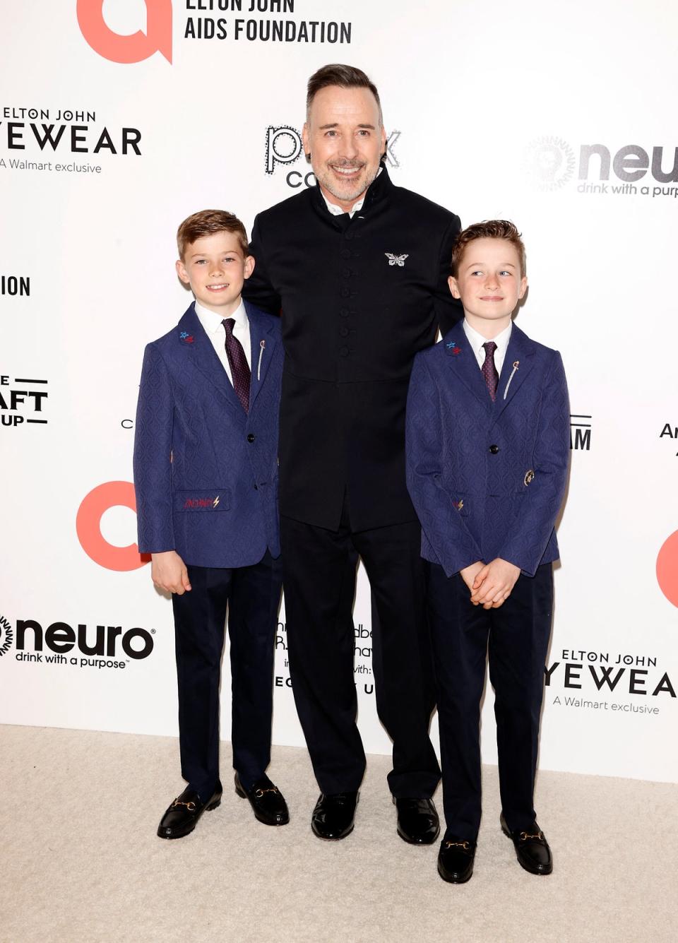 Furnish with his and Elton’s sons Elijah (left) and Zachary in 2022 (AFP via Getty Images)