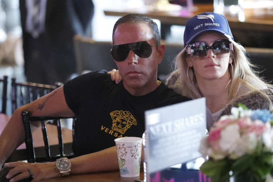 Race horse Next Shares co-owner Michael A. Iavarone and his wife Jules watch the draw for the Pegasus World Cup Horse Race, Wednesday, Jan. 22, 2020, in Hallandale Beach, Fla. The race will run Saturday, Jan. 25 at Gulfstream Park in Hallandale Beach. (AP Photo/Wilfredo Lee)