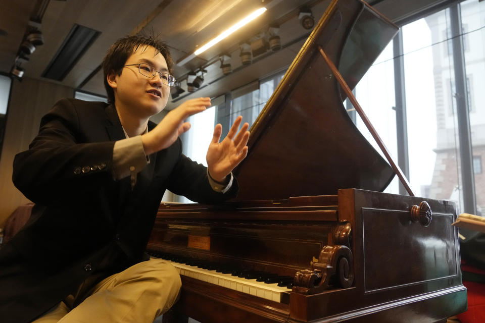 Canadian pianist Eric Guo talks to The Associated Press about playing music by Frederic Chopin on 19th century pianos, including one owned by the Romantic-era composer, to mark Chopin's 214th birthday, at the Fryderyk Chopin Institute, in Warsaw, Poland, Saturday, March 2, 2024. Guo won a quintannual competition to play Chopin on period instruments organized by the Institute. (AP Photo/Czarek Sokolowski)