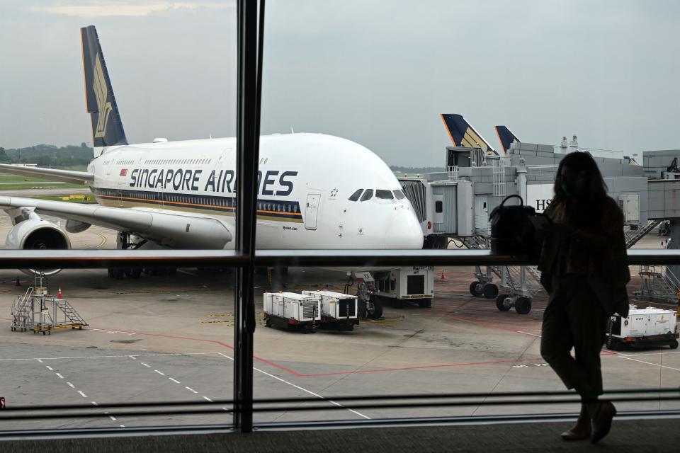 A Singapore Airlines Airbus A380 plane is seen parked on the tarmac at Singapore Changi Airport in Singapore on October 24, 2020.