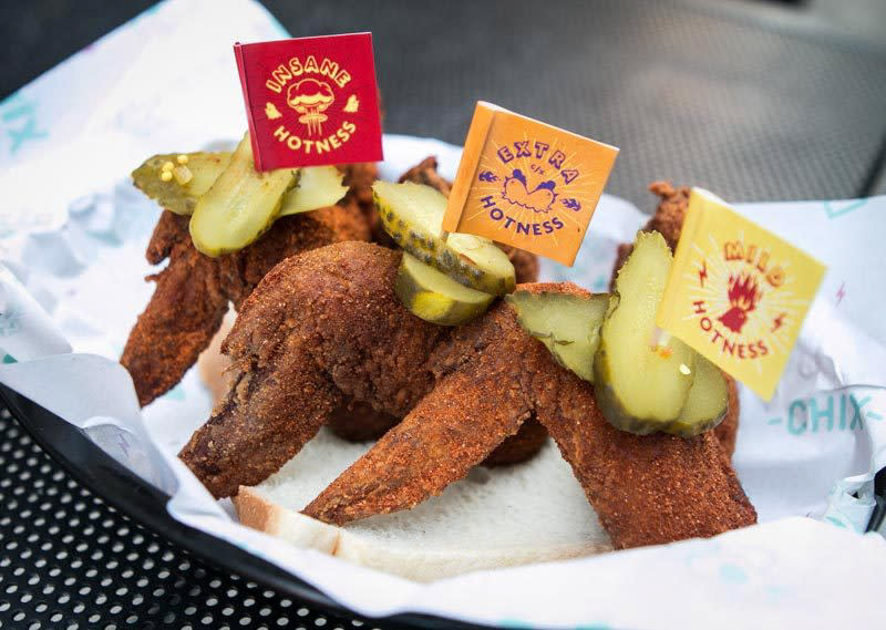 three different spice levels for wings at chix hot chicken