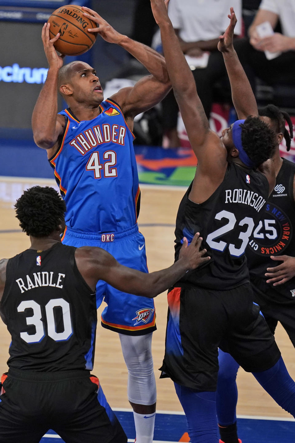 Oklahoma City Thunder's Al Horford (42) shoots during the first half of an NBA basketball game against the New York Knicks, Friday, Jan. 8, 2021, in New York. (AP Photo/Seth Wenig, Pool)