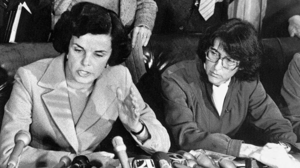 Dianne Feinstein, president of the board of supervisors, holds a press conference following the killing of Mayor George Moscone and supervisor Harvey milk. Feinstein, who was Moscone's designated successor, was in her office a few feet away from the shootings. "I heard shots. I heard three," she said. - Bettmann Archive/Getty Images