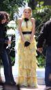 <p>At Serena's mum's controversial wedding to Bart Bass, Serena wore this ruffle-neck Ralph Lauren gown straight off the catwalk. The black gloves, belt, and flower detail were all part of the original runway look.</p>