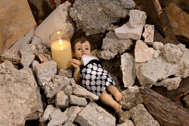 An installation of the baby Jesus laying in ruins, symbolizing children killed in Gaza, is seen in the Evangelical Lutheran Christmas Church in the biblical town of Bethlehem, West Bank, on Monday. UNICEF said Thursday that 83 children, a record number, have been killed in West Bank violence this year as it called on all parties in the war to abide by international human rights law to protect children. Photo by Debbie Hill/ UPI