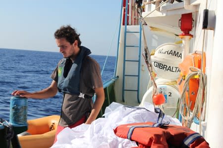 Miguel Duarte walks on the deck of the Iuventa ship on the Mediterranean Sea