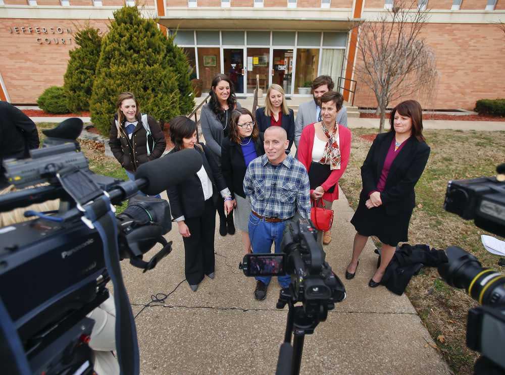 The Jefferson County Commission last week voted to offer a settlement totaling $7.5 million to Floyd Bledsoe, shown in the checkered shirt, who served 16 years behind bars. Bledsoe was convicted in that county of a murder and sexual assault he didn't commit.