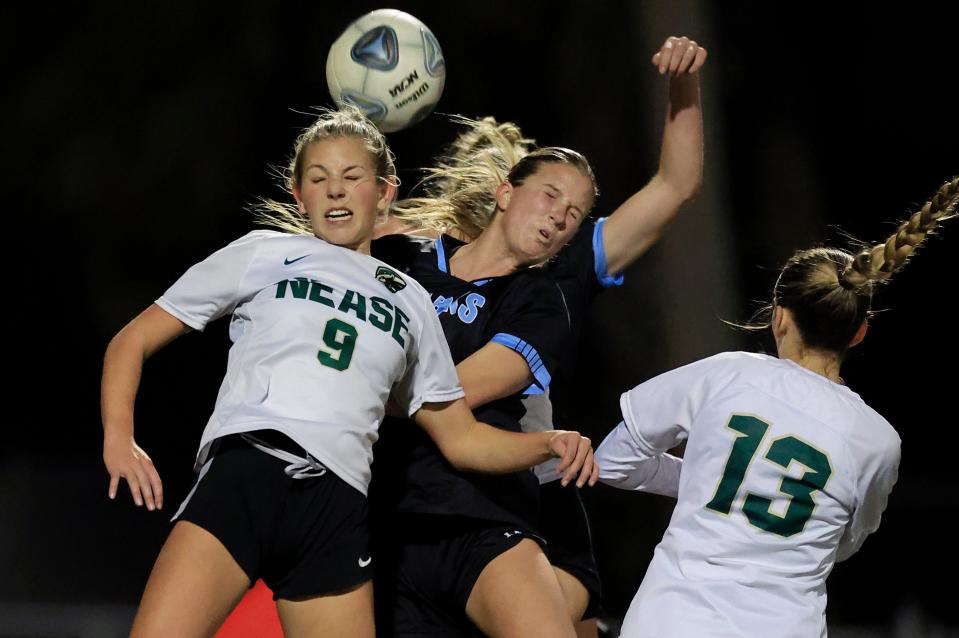 Nease's Skylar Kurtz (9) and Ponte Vedra's Hadley Conway (19) leap for a header near Nease’s goal during the first half of a FHSAA District 3-6A high school girls soccer championship matchup Wednesday, Jan. 31, 2024 at Fletcher High School Athletic Complex in Jacksonville Beach, Fla. Ponte Vedra defeated Nease 3-0. [Corey Perrine/Florida Times-Union]
