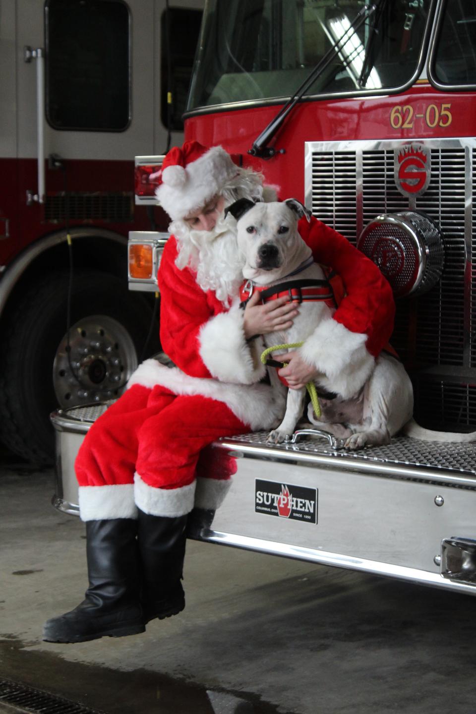 Also as a part of the adoption event at the city hall complex, pet owners could get their photos taken with Santa Claus, free of charge, like Rocky the dog did. Rocky is available for adoption at the Cheboygan County Humane Society.