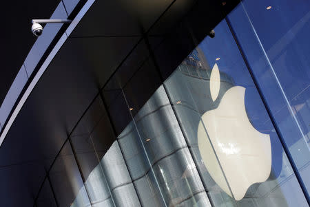 FILE PHOTO: A surveillance camera is seen outside an Apple store in Beijing, China December 12, 2018. REUTERS/Jason Lee - RC16141EEEF0/File Photo