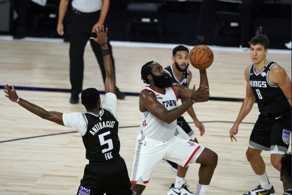 Houston's James Harden puts up a shot past Sacramento on Aug. 9, 2020.