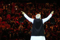 Indian Prime Minister Narendra Modi gestures as he delivers his speech during an Indian community event at Qudos Bank Arena in Sydney, Australia, Tuesday, May 23, 2023. Modi has arrived in Sydney for his second Australian visit as India's prime minister and told local media he wants closer bilateral defense and security ties as China's influence in the Indo-Pacific region grows. (AP Photo/Mark Baker)